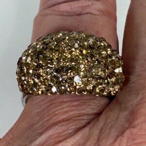 Copper-colored crystal fashion ring with silver-tone band.